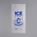 A clear plastic ice bag with a blue and white penguin print.