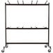 A white and black metal rack with metal rods and four wheels for National Public Seating Folding Chairs.
