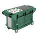 A green Cambro Versa Ultra work table with storage and heavy-duty casters.