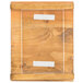 A clear plastic frame with two white labels on a wooden surface.