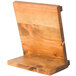 A Cal-Mil Madera rustic pine wooden displayette stand on a table.