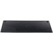 A black rectangular melamine serving platter with a faux slate design on a table.