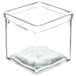 A clear square glass jar with a lid on a white background.