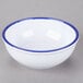 A white Cal-Mil melamine bowl with blue rim.