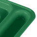 A close-up of a green Cambro compartment tray with six compartments.