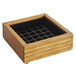 A Madera wooden drip tray with a grid inside.