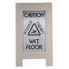 A Cal-Mil 2-sided wet floor sign with a triangle and text.