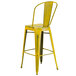 A Flash Furniture yellow metal bar stool with a backrest and vertical slat back.