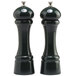 A Chef Specialties Autumn Hues forest green pepper mill and salt mill set with black handles and green caps.