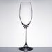 A clear Spiegelau Vino Grande flute glass on a table.