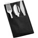 A black napkin with a Visions silver plastic fork inside.