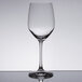 A clear Spiegelau Vino Grande wine glass on a table.