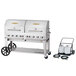 A Crown Verity mobile outdoor grill on a cart with two white propane tanks.