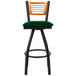 A BFM Seating bar stool with a green vinyl swivel seat and black metal legs.