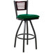 A BFM Seating black metal bar stool with a green vinyl swivel seat.