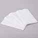 A stack of white Response 2-Ply Eco-Friendly Dinner Napkins.