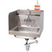 A stainless steel Advance Tabco hand sink with a splash mounted faucet.