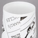 An American Metalcraft paper French fry cup with black and white text.
