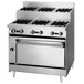 A stainless steel Blodgett commercial gas range with six burners and a convection oven.