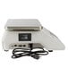 A white Cardinal Detecto digital price computing scale with a black power cord.