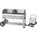 A Crown Verity 60" mobile outdoor grill with cart, wheels, and propane tanks.