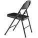 A National Public Seating black metal folding chair with a black seat.