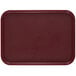 A dark cranberry rectangular Cambro tray with a non-skid surface.