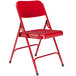 A red National Public Seating metal folding chair.