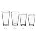 A row of clear Acopa mixing glasses with measurements.