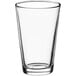 An Acopa customizable mixing glass with a clear bottom.