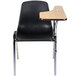 A black National Public Seating chair with a light oak tablet arm.