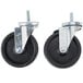 A pair of black Master-Bilt swivel stem casters with silver wheels.