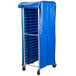 A blue vinyl Regency bun pan rack cover on a cart.