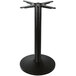A FLAT Tech black round metal table base with a black pole.