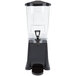 A black and clear plastic Carlisle beverage dispenser with a black lid and spout.