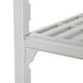A white plastic Cambro Camshelving Premium unit with 5 vented shelves.