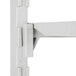 A white plastic bracket for Cambro Camshelving®.