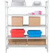 A white Cambro Camshelving® Premium unit with 5 vented shelves holding boxes and plastic containers.