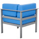 A soft gray BFM Seating aluminum armchair with a blue cushion and left armrest.