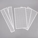 A set of white paper sheets with grid squares.