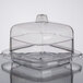 A clear square container with a lid.