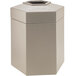 A beige hexagonal Commercial Zone PolyTec waste container with an open top.