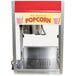 A Paragon popcorn popper with a red and yellow sign on it.