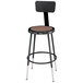 A black National Public Seating lab stool with a brown hardboard seat and back.