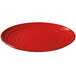 A red plate with spirals on it.
