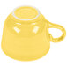 A Fiesta sunflower yellow china cup with a handle.
