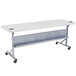 A white rectangular NPS folding table with wheels.