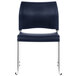 A navy blue National Public Seating stack chair with chrome legs.