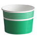 A green paper frozen yogurt cup with white stripes.