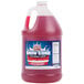A large jug of Carnival King strawberry snow cone syrup.